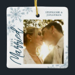 First Christmas Married Snowflakes Photo Ceramic Ornament<br><div class="desc">This square Christmas ornament is a perfect gift for the newly married couple. The design features a photo frame with handwritten text "Married" and is accented with light blue snowflakes. Personalise with a pictures of the couple,  their names and year.</div>