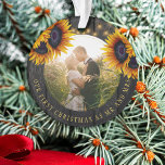 First Christmas Mr and Mrs sunflower rustic photo Ornament<br><div class="desc">Rustic country newlyweds wedding round photo First Christmas as Mr. and Mrs. personalised tree ornament with yellow gold sunflower bouquets over a dark brown barn wood with strings of twinkle lights. Easy to customise with your names, text and photo! It can be a pretty keepsake gift for a new couple....</div>