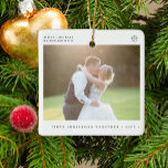 First Christmas together married and merry photo Ceramic Ornament<br><div class="desc">Simple minimalist typography First Christmas together married and merry custom couple's photo,  names,  and year tree ornament.</div>