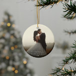 First Christmas Wedding Day Photo Calligraphy Ceramic Ornament<br><div class="desc">A festive piece that turns your cherished memories into a timeless holiday treasure! Perfectly capturing the spirit of togetherness and joy, this elegant ornament allows you to personalise your Christmas tree with a special snapshot of your brightest moments. Designed to complement your holiday decor, this keepsake is more than an...</div>