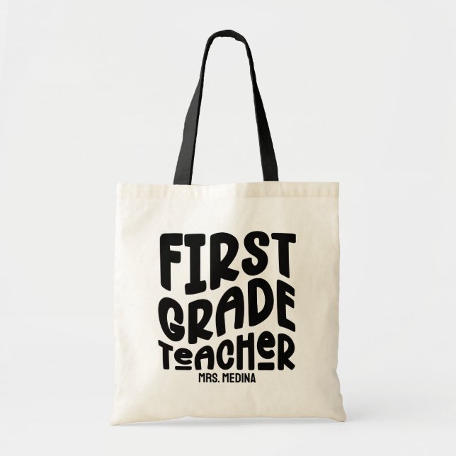 First Grade Teacher Black Typography Custom Tote Bag (Front)