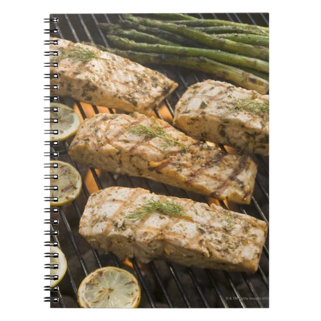 Fish and asparagus cooking on grill notebook (Front)