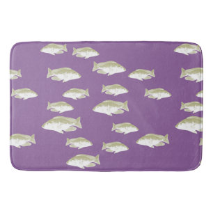 Fish on purple bath mat