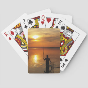 Fisherman catches fish by spinning playing cards