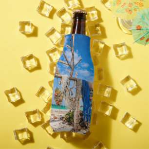 Fishing nets drying on the beach bottle cooler
