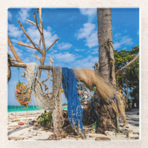 Fishing nets drying on the beach glass coaster