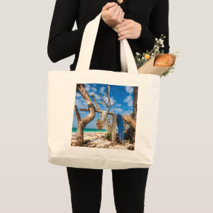 Fishing nets drying on the beach large tote bag