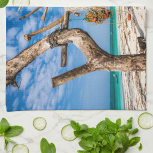 Fishing nets drying on the beach tea towel