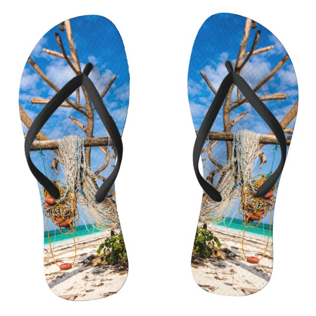 Fishing nets drying on the beach thongs (Footbed)