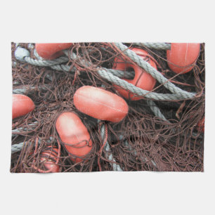 Fishing nets, floats and rope on the harbour tea towel