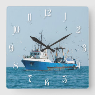 Fishing vessel comes back to the port square wall clock