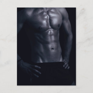 Fit man with muscles postcard
