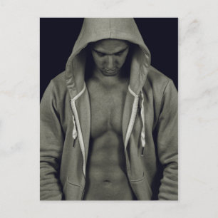 Fit man with muscles postcard