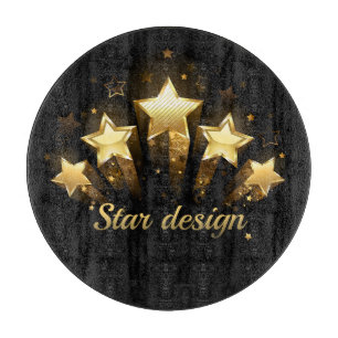 Five gold stars on black cutting board