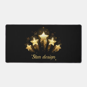 Five gold stars on black desk mat