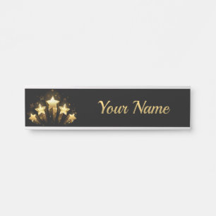 Five gold stars on black door sign