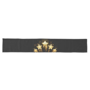 Five gold stars on black long table runner