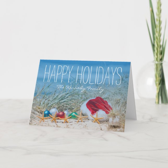 Five starfish on a beach with a Santa hat Holiday Card (Front)