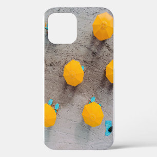 Five yellow umbrellas on sand at daytime iPhone 12 case