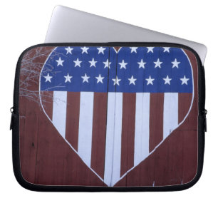 Flag in heart shape painted on barn after 9-11. laptop sleeve