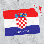Flag of Croatia With Custom Text Jigsaw Puzzle<br><div class="desc">This puzzle features the flag of Croatia with the Croatian coat of arms and a customisable text "CROATIA" in white font on the blue stripe.</div>