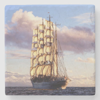 Flag ship setting sail at sea stone coaster
