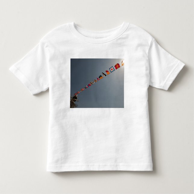Flags fly over the deck of the USS Iwo Jima Toddler T-Shirt (Front)