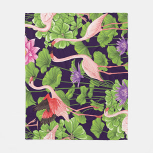 Flamingo, tropical plants, black background. fleece blanket