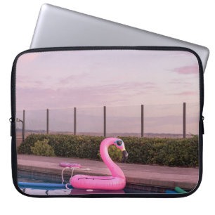 Flamingo water floater in swimming pool laptop sleeve