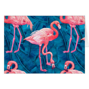 Flamingos on blue banana leaves
