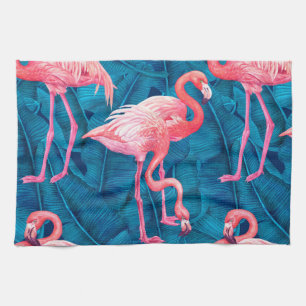 Flamingos on blue banana leaves tea towel