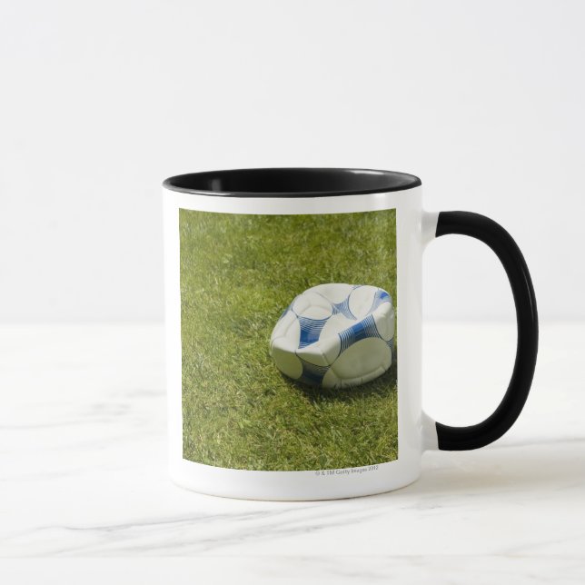 Flat soccer ball in grass, Germany Mug (Right)