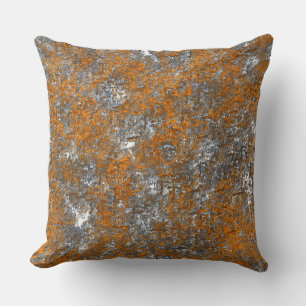 Flecked with golden orange over whitish grey rough cushion