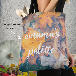 Floating autumn leaves tote bag