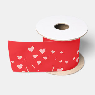 floating hearts on red satin ribbon