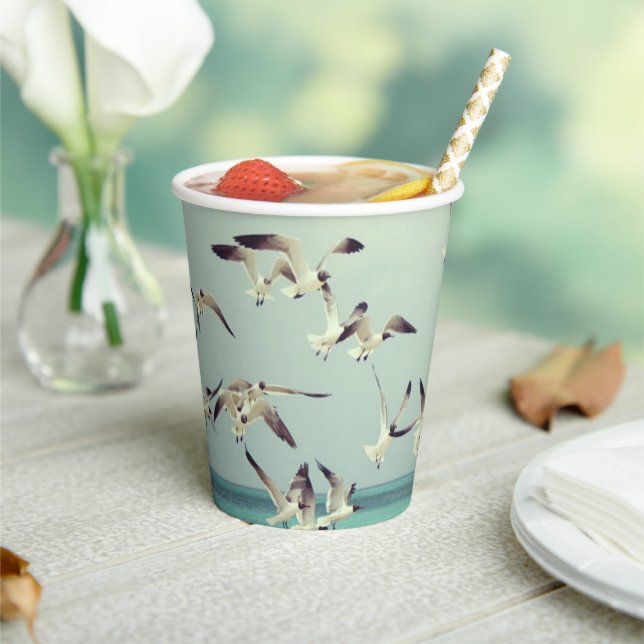 Flock of Flying Seagulls Over Ocean Paper Cups (Insitu)