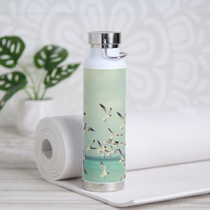 Flock of Flying Seagulls Over Ocean. Water Bottle