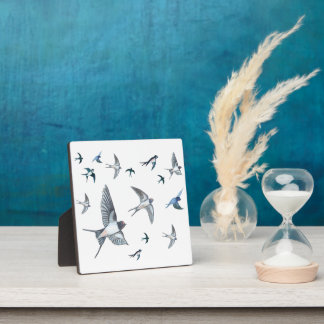 Flock of swallow birds flying plaque