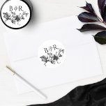 Floral Black and White Wedding Envelope Seal/Favou Classic Round Sticker<br><div class="desc">Elegant wedding sticker with beautiful hand drawn floral detail in black with couple's initials. Ideal as envelope seal or favour label. Part of our "Black and White Enchanting Garlands" collection with a variety of coordinating products available,  including envelopes. Visit the entire collection at: https://www.zazzle.com/collections/black_and_white_enchanting_garlands_collecti-119853596760425870</div>