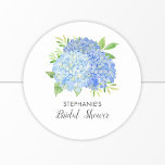 Floral Blue Hydrangea Bouquet Bridal Shower  Classic Round Sticker<br><div class="desc">These bridal shower stickers feature watercolor blue hydrangea flowers and green foliage Personalise the text with the bride's name. These stickers are ideal for use as envelope seal stickers or for decorating favours. Matching bridal shower party supplies also available.</div>