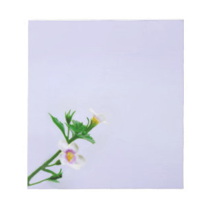 Floral Design On Blue Notepad