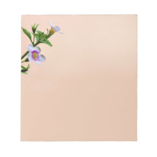 Floral Design On Pink Notepad
