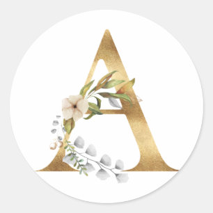 Floral monogram in gold classic round sticker