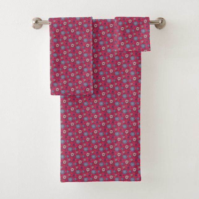 Floral pattern hang against a white wall bath towel set (Creator Uploaded)