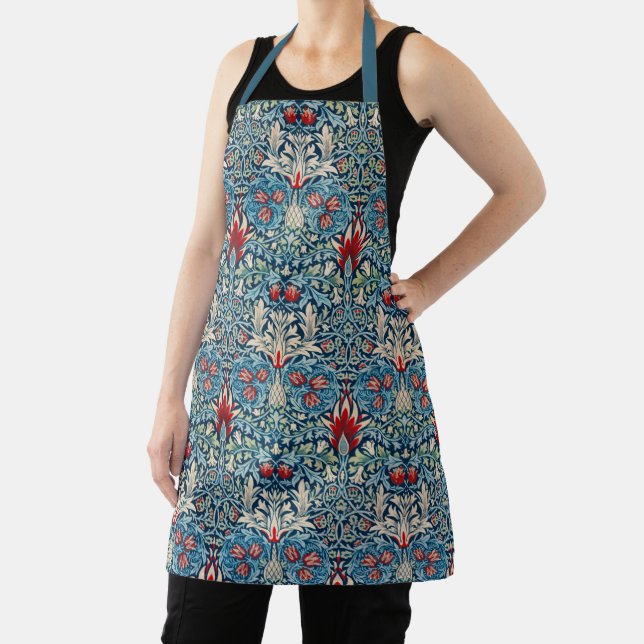 Floral pattern on green leaves blue background apron (Insitu)