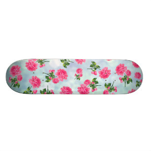 Floral patterns: pink flowers on blue bokeh skateboard