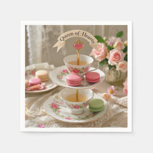 Floral table, teacups, tiered trays macarons queen napkin