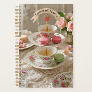 Floral table, teacups, tiered trays macarons queen planner