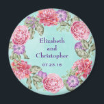 Floral Watercolor Wreath Pretty Wedding Magnet<br><div class="desc">A pretty wedding keepsake / commemorative or save the date magnet. A beautiful botanical themed illustration with a circular wreath of pretty watercolor flowers in pink and purple with green leaves in between. The floral design is made up of pink peonies and purple anemones. The background is a soft mint...</div>