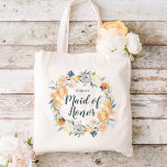 Floral Wreath Monogrammed Maid of Honour Tote Bag<br><div class="desc">Custom wedding bridal party tote bags personalised with your bridesmaid's name or other custom text. This elegant feminine design has a watercolor floral wreath with dusty blue grey and peachy yellow flowers. Use the design tools to personalise each monogram, choose any background colour, edit text fonts and colours and add...</div>